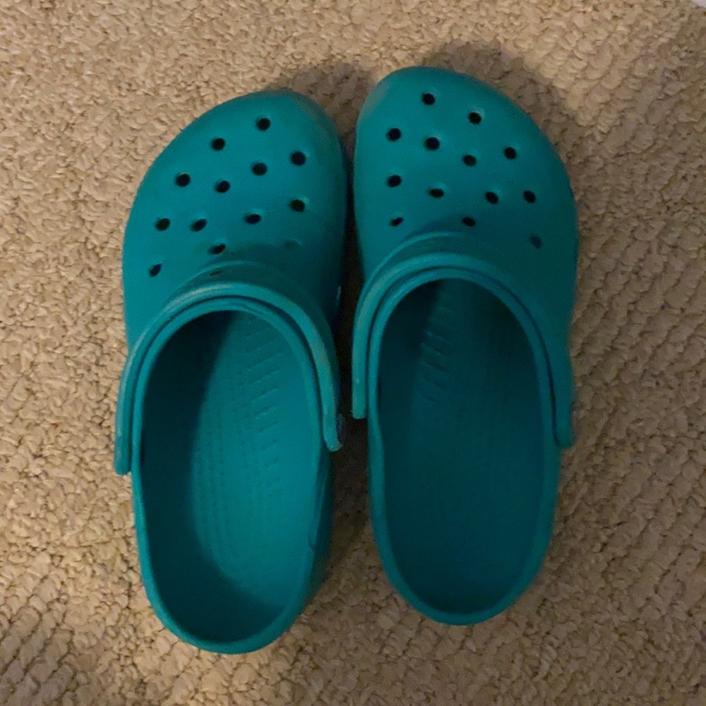 teal crocs, more teal than in the picture